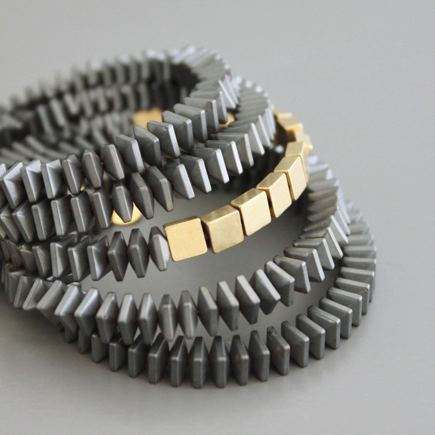 David Aubrey | Hematite and brass wrap bracelet