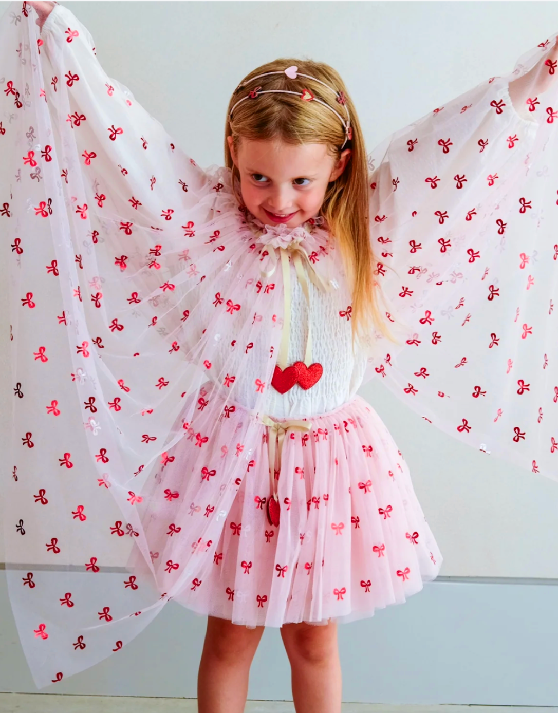 Mimi & Lula | Cutesy bow print cape