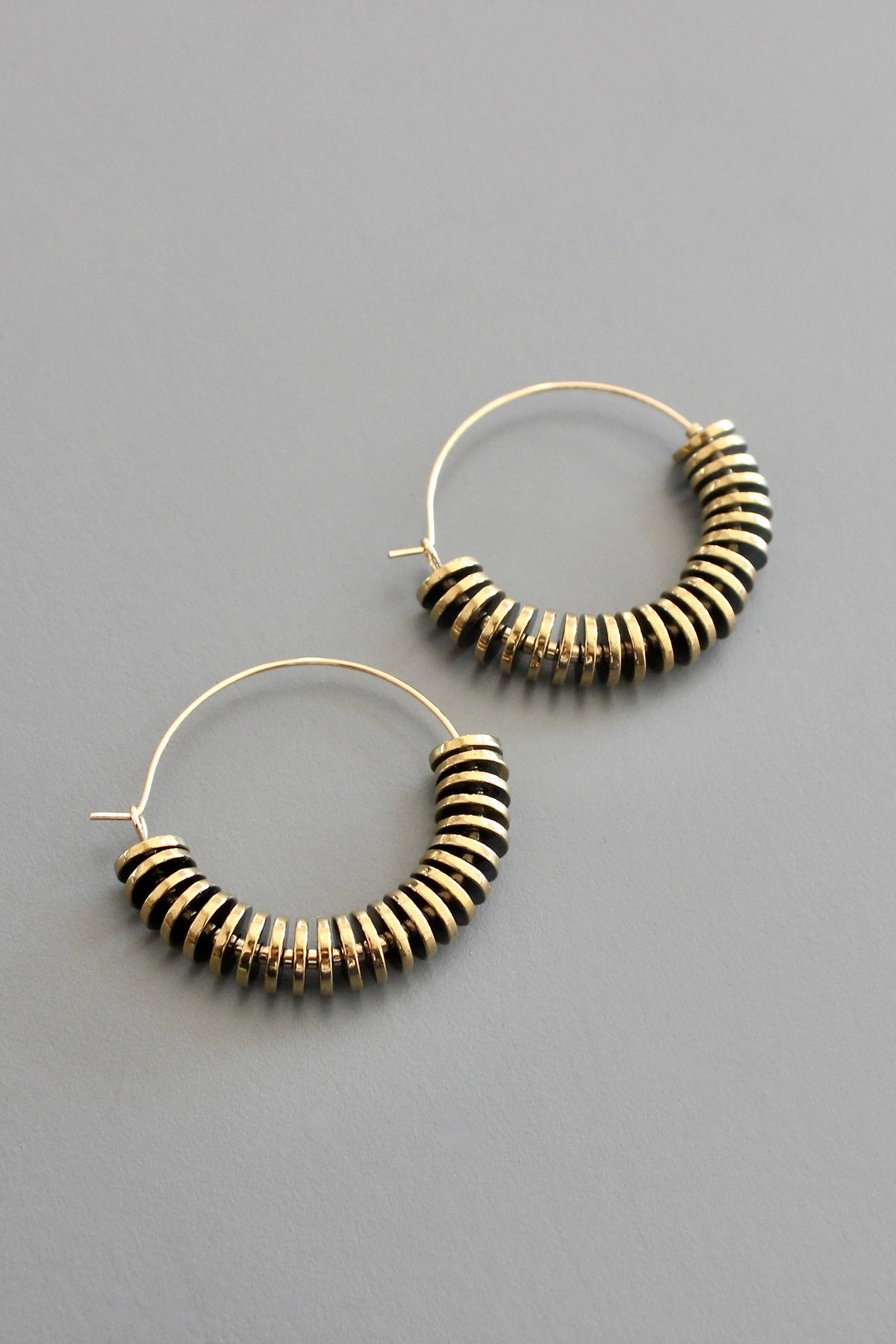 David Aubrey |  Gold hematite hoop earrings